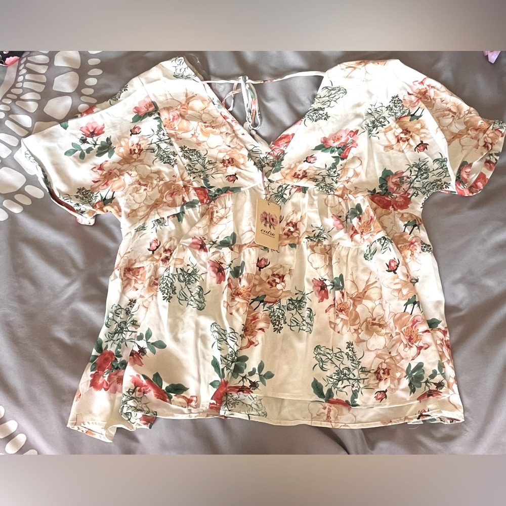 NWT Gorgeous, white flow top with floral details. Size: Large